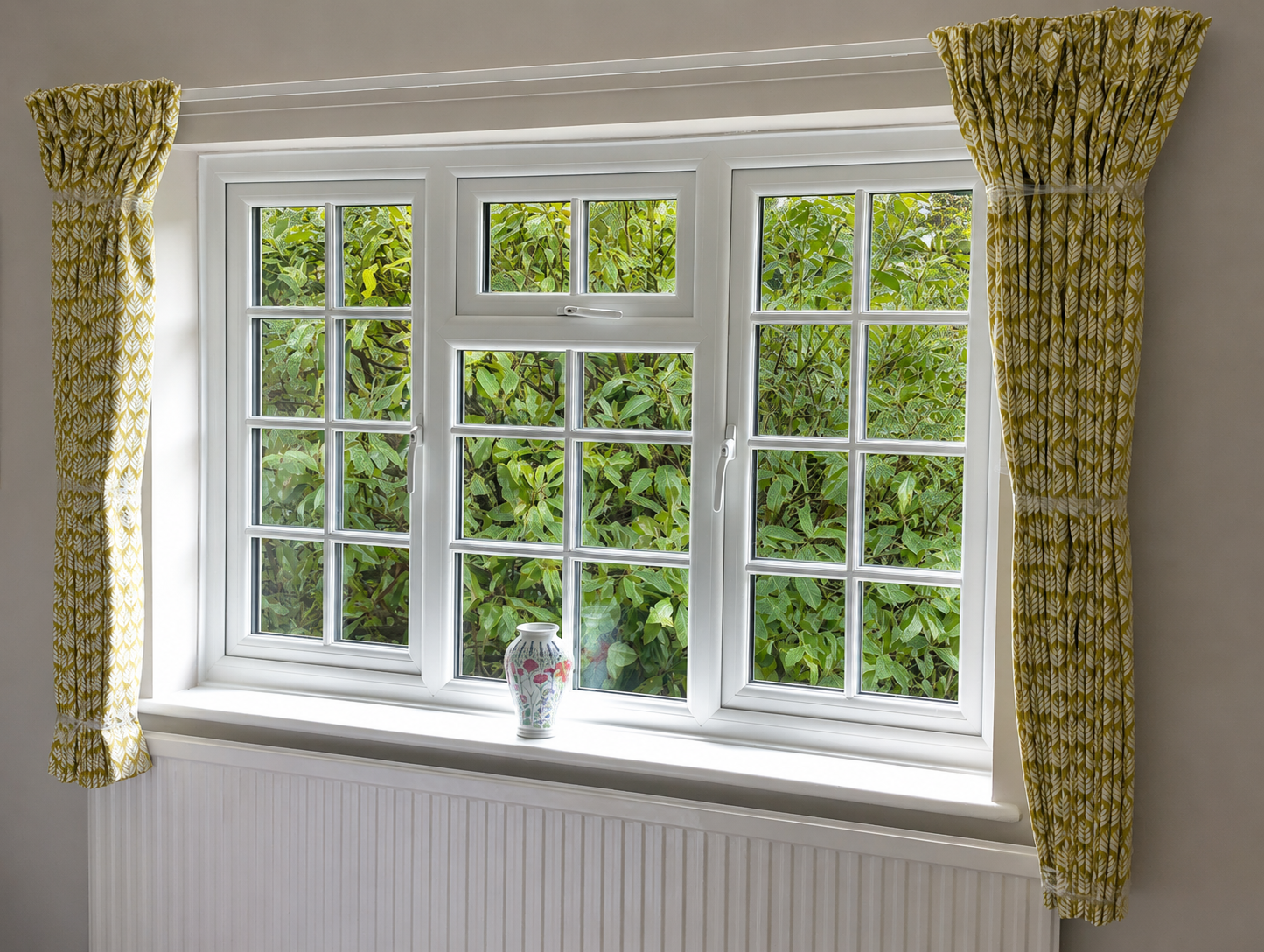 Bright window with bespoke curtains made and fitted by Soft Options